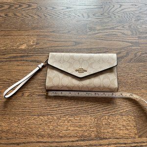 COACH beige C pattern clutch/wristlet
